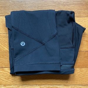 lululemon!  size 8. black (sorry some pics look blue)